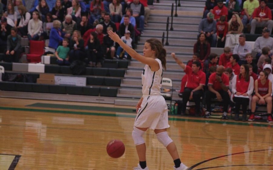 Senior LaMyah Ricks communicates with her teammates on the court during a  home, girls’ basketball game in 2018.