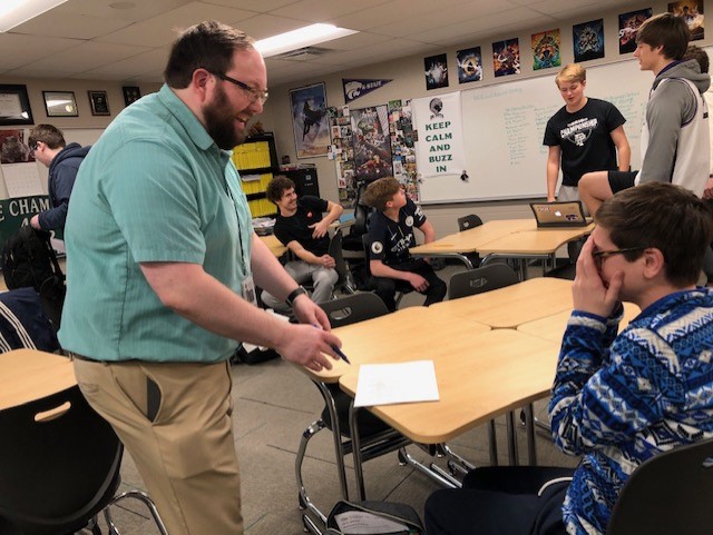 Junior Luke LeBar laughs as English teacher Phillip Hamilton tells a classic dad joke on January 22, 2020.