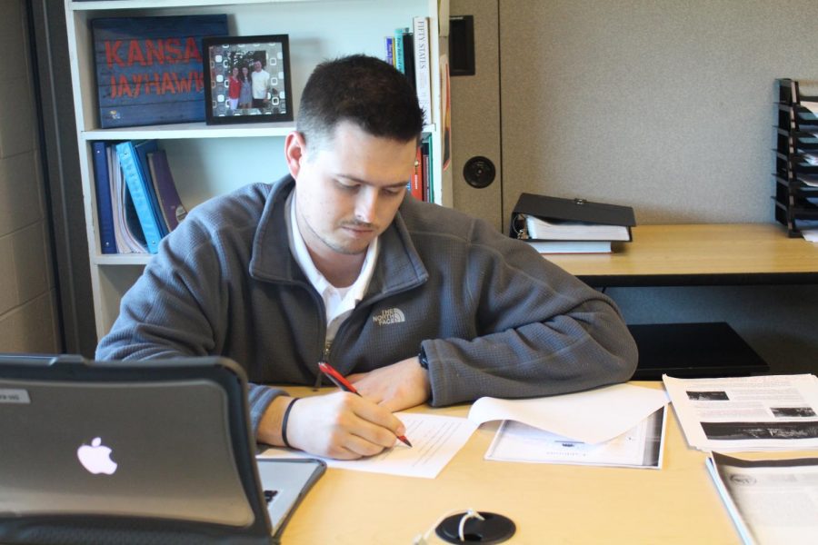 Bennett Ratzloff grades his World Geography students’ assignments on Feb. 11, 2020. 
