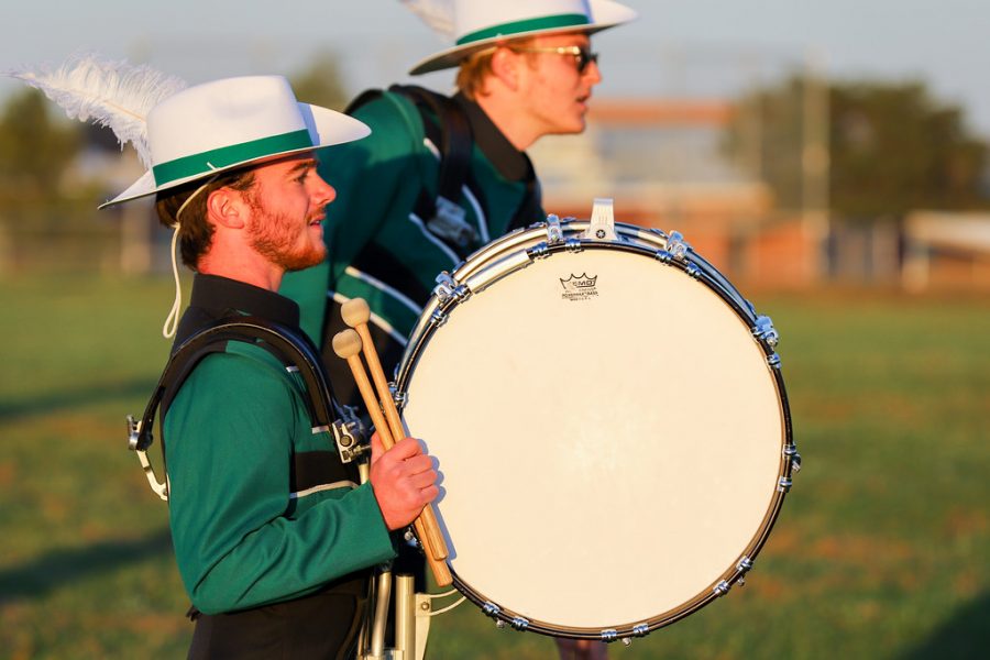 Senior Chase O’Bannon prepares to march at the home football game on Oct. 25, 2019.