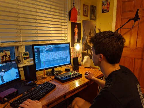 Junior Caleb Kmiecik works on producing a song on March 13, 2020.