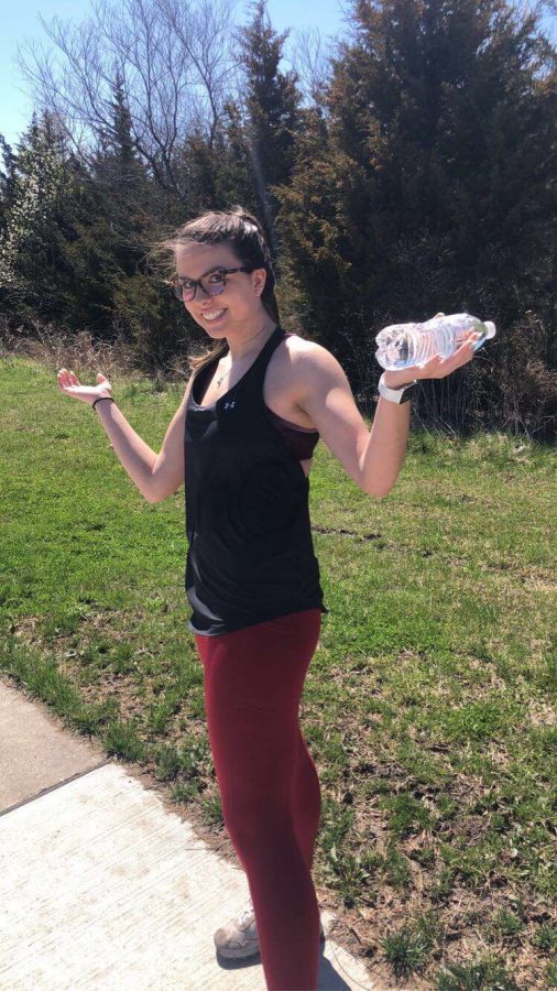 Senior Emma Blom poses on a walk with her family on March 28.