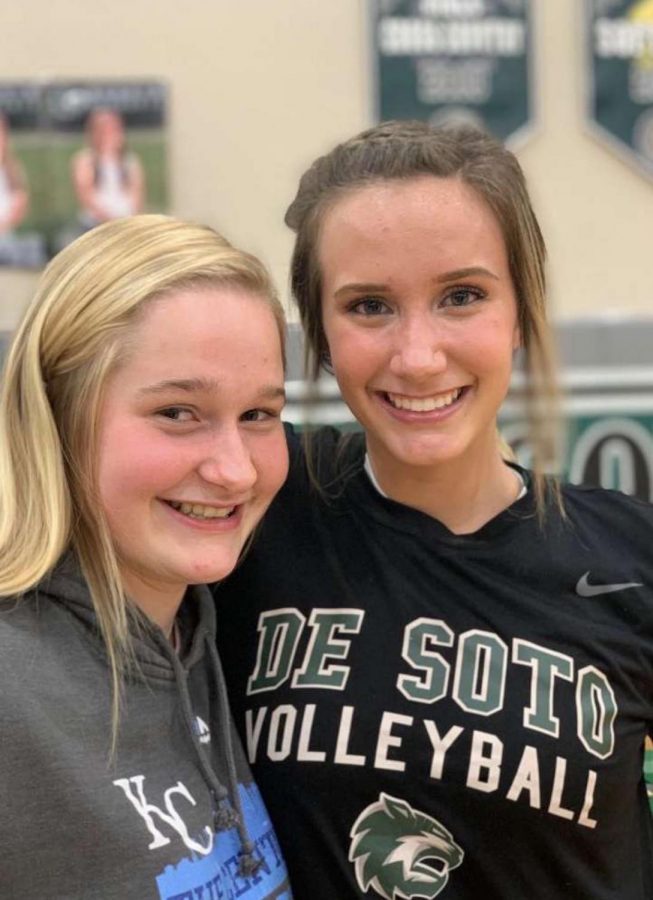 Senior Taylor Ellis and freshman Anna Haswell pose for a photo after a home volleyball match on Oct 15.