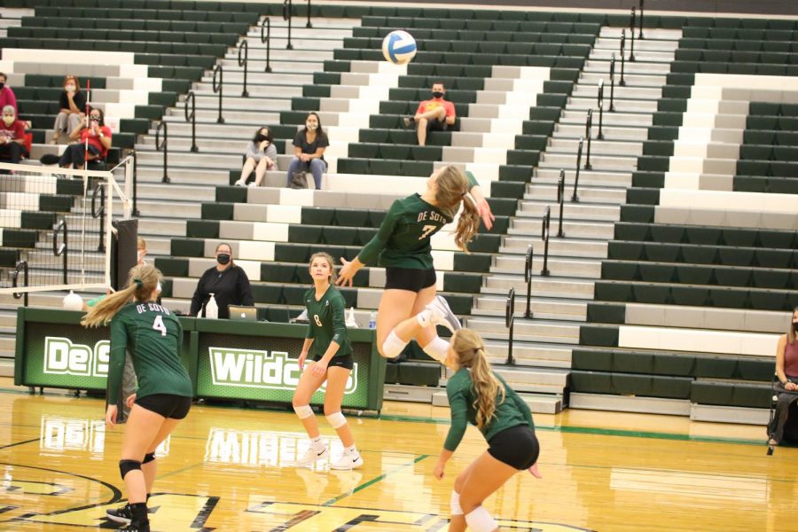 Senior outside hitter Brooke Stonestreet goes up for an attack in the Wildcats victory over Shawnee Mission North on Sept. 17.