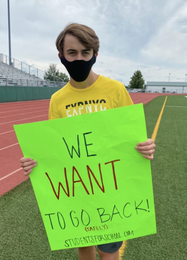  Brent Smith Holding a peaceful protest sign at an SCRC sponsored protest