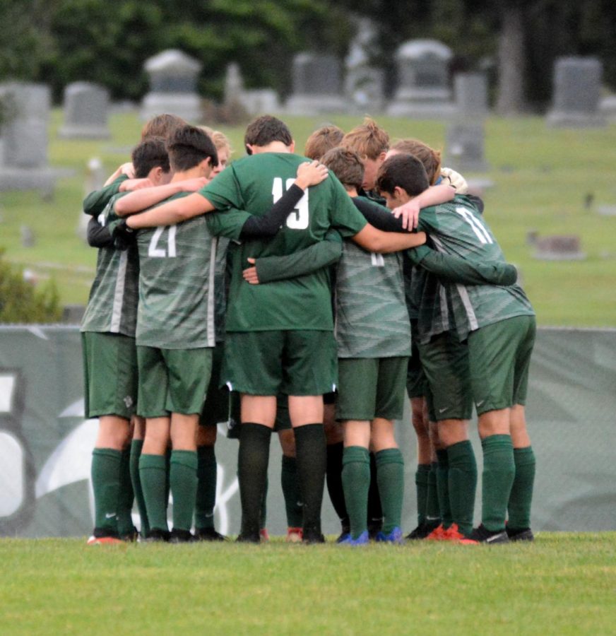 Dhs soccer team gather in huddle before match against Mill Valley on Sep. 8th