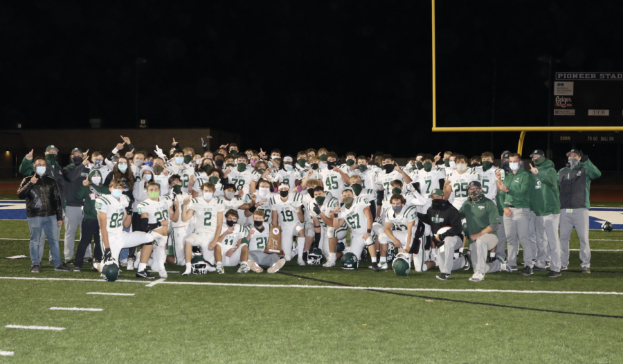 The De Soto High School football team celebrates its second straight United Kansas Conference title after defeating Leavenworth on Oct. 16.