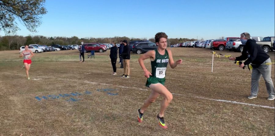 Carson Sturdy runs at the Kansas State Cross Country Championships on Oct. 31 in Augusta. 