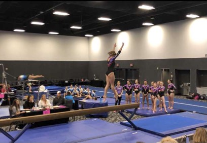 Taken By Father, John Davies in February 2019 at Sheraton Crown Center in Kansas City. Davies jumping on a balance beam during a routine.
