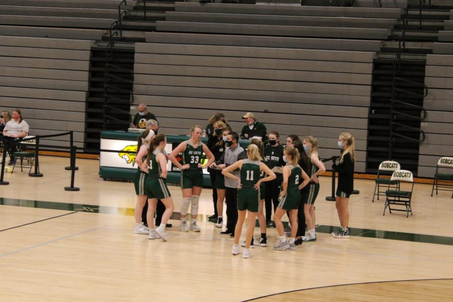 The De Soto High School girls' basketball team huddles during a game against Basehor-Linwood on Jan. 8.