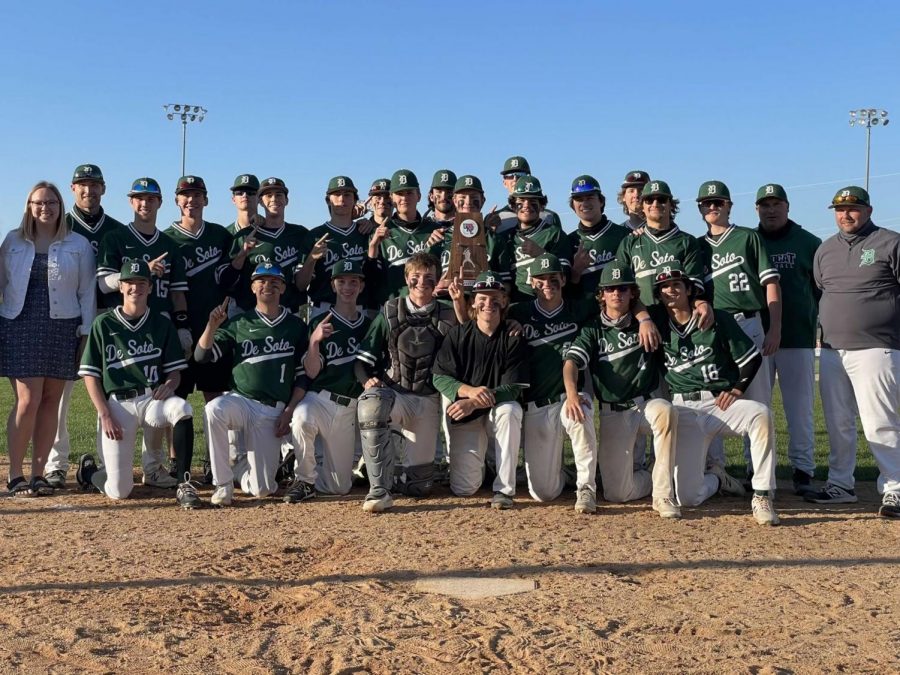 The De Soto High School varsity baseball team celebrates after becoming the United Kansas Conference champions on Thursday, May 7. 
