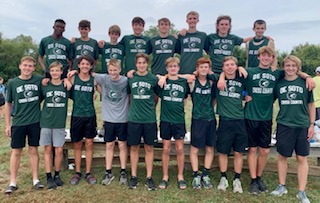 The DHS boys' cross country team poses for a picture at the KC Metro Classic on Oct. 2. 