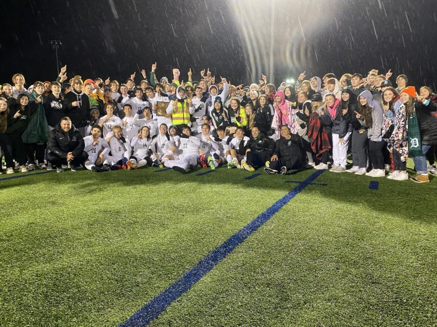 Varsity soccer pose with student section after defeating Mill Valley and becoming regional champs on Thursday, Oct. 26.