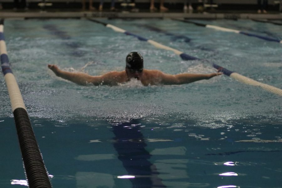 A DHS boys' swim member competes at a meet on Dec. 17, 2020.