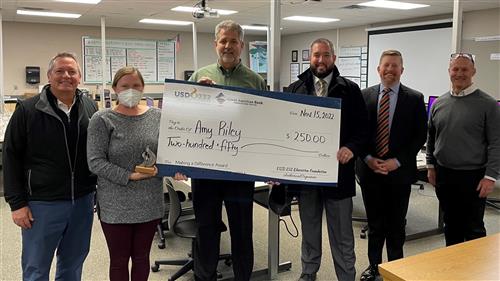 From left: Great American Bank 
Exec. Vice President, Mark Gonzales; Making a Difference winner Amy Riley; USD 232 Superintendent Frank Harwood; Great American Bank CFO Matt Little; USD232EF Board Member Chuck Neill; and DHS Principal Sam Ruff.